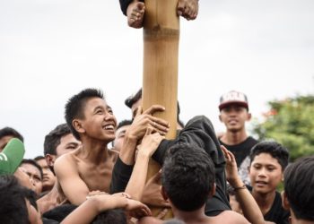Sejarah Panjat Pinang dalam Perayaan Kemerdekaan Indonesia