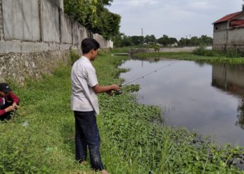 Liburan ala Kelompok Pemancing Ikan Rawa Bojonegoro
